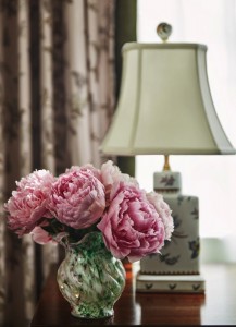 Beautiful soft pink and white flowers in a vase in our historic Garden District hotel in New Orleans