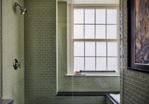 Tiled bathroom with window at The Pontchartrain Hotel