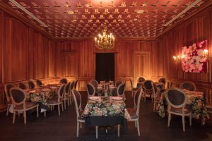 New Orleans boutique hotel event space with chairs and wodden pannels
