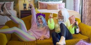 Two women celebrating Mardi Gras at our boutique hotel in New Orleans