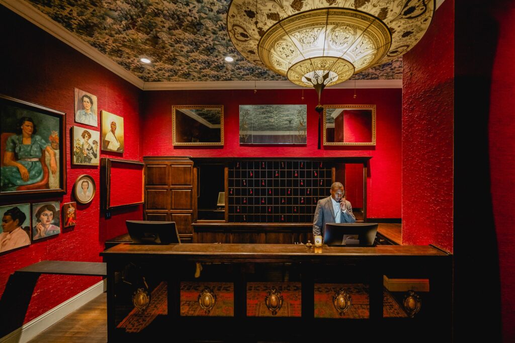 Front desk of our hotel in New Orleans' Garden District, decorated in red