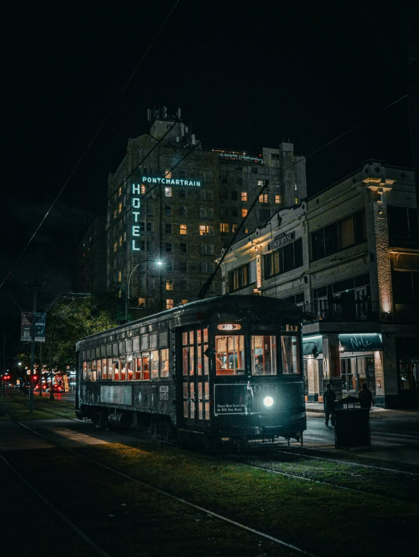 Streetcar at night passing Pontchartrain Hotel